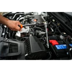 3/8" DRIVE 4 PIECE 12" EIGHTY8 TOOTH LOCKING FLEX RATCHET WITH CHROME EXTENSIONS 3", 6" AND 8" SET - ORANGE -Hand Tool Store BFR128SETM In UseImage 04 1500