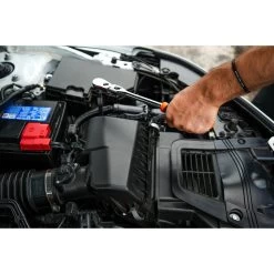 3/8" DRIVE 4 PIECE 12" EIGHTY8 TOOTH LOCKING FLEX RATCHET WITH CHROME EXTENSIONS 3", 6" AND 8" SET - ORANGE -Hand Tool Store BFR128SETM In UseImage 06 1500