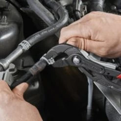 SPRING HOSE CLAMP PLIERS WITH LOCKING DEVICE -Hand Tool Store PHCL10 InUseImage 02 1500