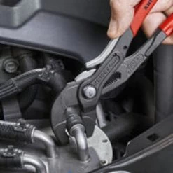 SPRING HOSE CLAMP PLIERS WITH LOCKING DEVICE -Hand Tool Store PHCL10 InUseImage 03 1500