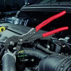 SPRING HOSE CLAMP PLIERS WITH LOCKING DEVICE -Hand Tool Store PHCL10 InUseImage 06 1500